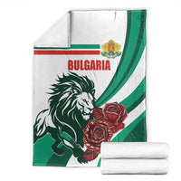 Bulgaria blanket with lion, red roses, and green stripes; folded for storage