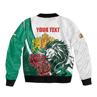 White and green satin bomber jacket with lion crest and rose graphics, ribbed hem and cuffs