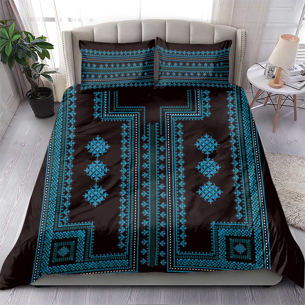 Blue and black bedding set with bold cross-like central pattern and pillow covers