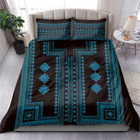 Blue and black bedding set with bold cross-like central pattern and pillow covers