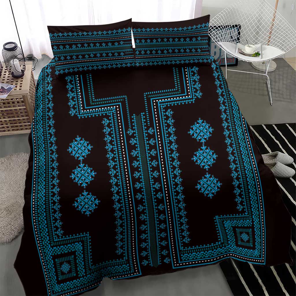 Blue and black bedding set with large central geometric motif and pillow covers