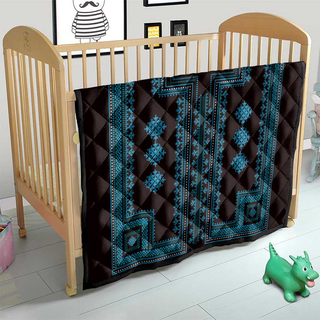 Black quilt blanket with blue geometric medallion panels and stitched border
