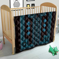 Black quilt blanket with blue geometric medallion panels and stitched border