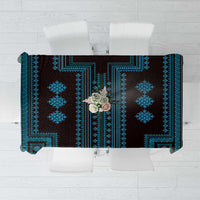 Geometric tablecloth top view: blue motifs on dark background