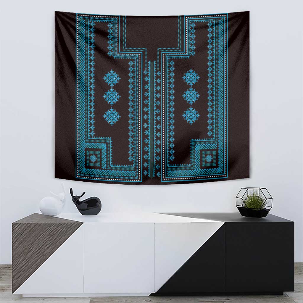 Traditional wall tapestry above modern cabinet, blue geometric design on dark fabric