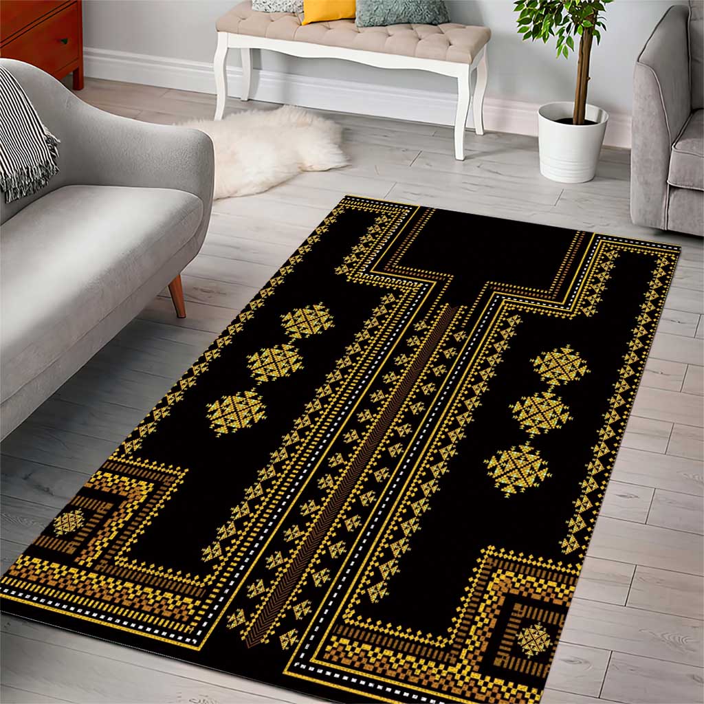 Rectangular black area rug with gold geometric lines and diamond motifs
