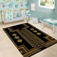 Black area rug with gold geometric medallions and horizontal pattern stripes