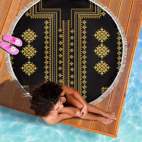 Round beach blanket top view: black with gold geometric pattern and white fringed border