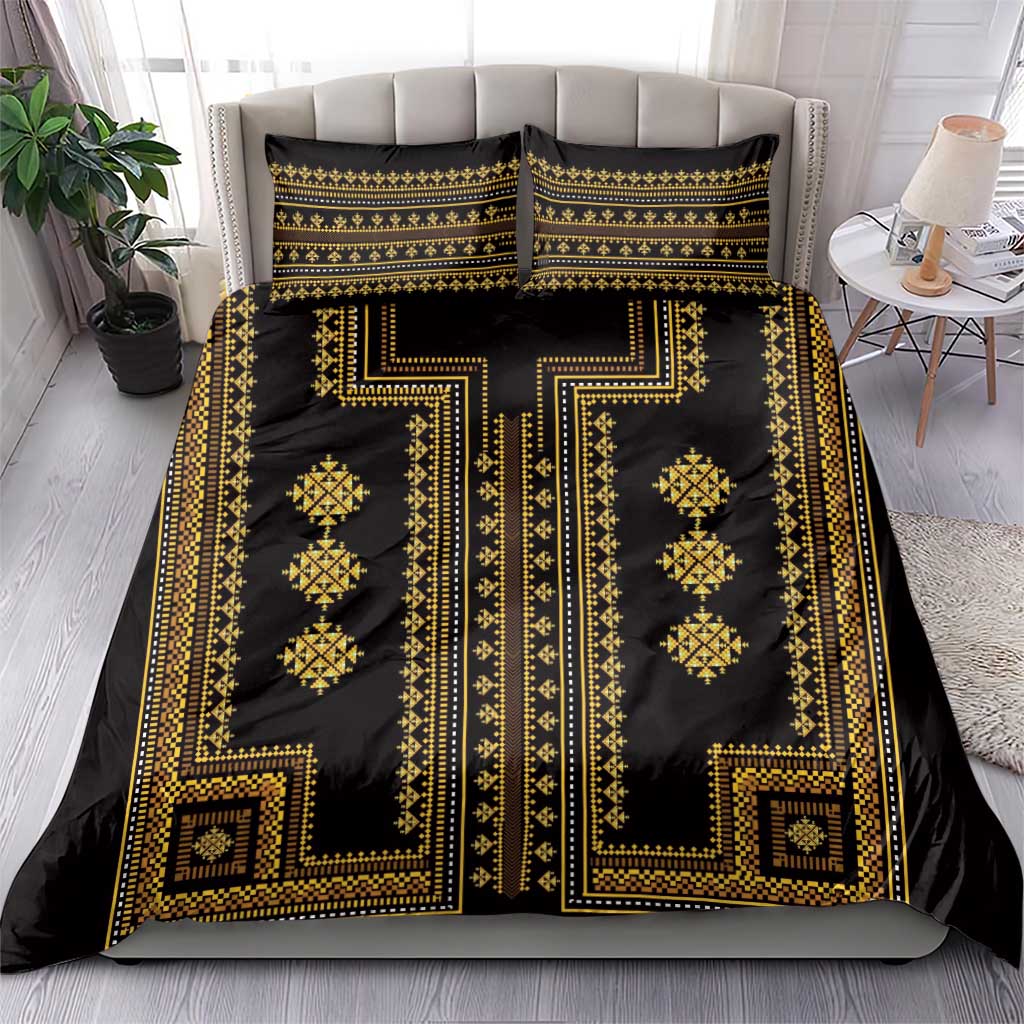 Black and gold patterned bedding set with duvet cover and two pillow shams