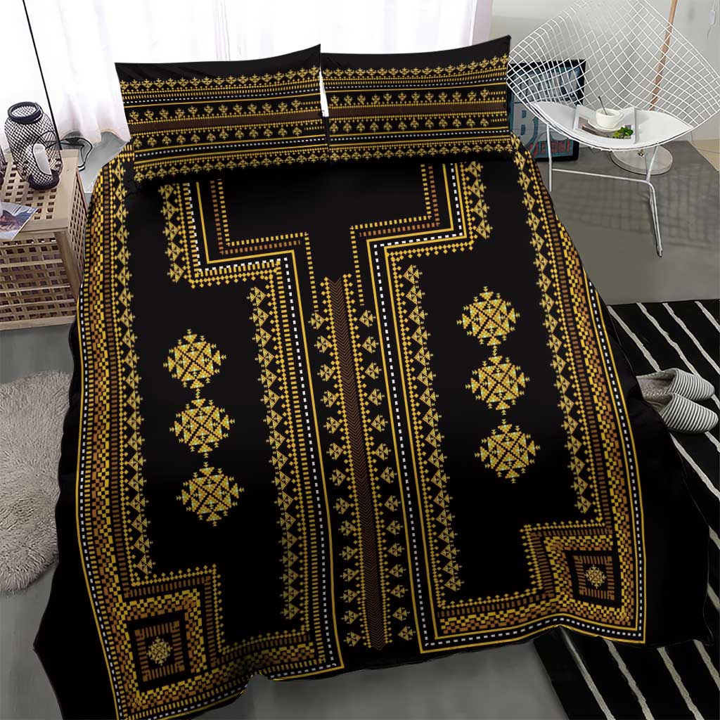 Black and gold patterned bedding set with duvet cover and two pillow shams
