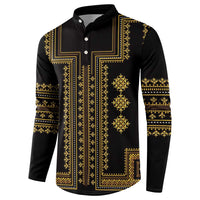 Black long-sleeve henley sweatshirt with gold geometric panel print and decorative cuffs