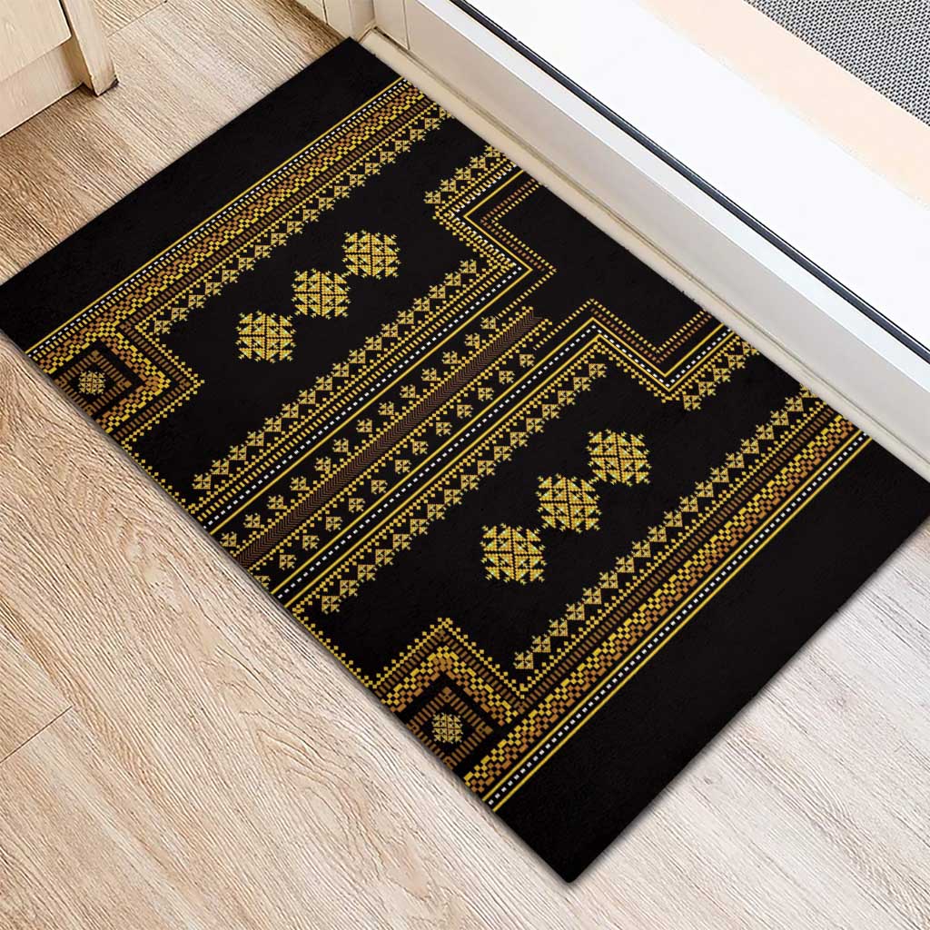Rectangular rubber doormat with black base and gold zigzag geometric border pattern