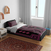 Black bedding set with magenta patterned runner design and matching pillow shams