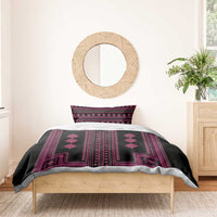 Black bed set with magenta vertical stripe and geometric frame pattern, includes duvet