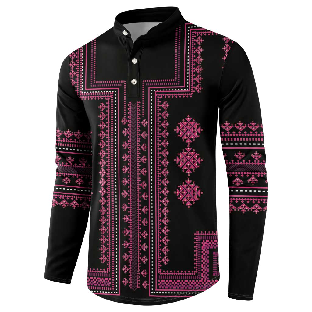 Black button-front sweatshirt with pink vertical geometric panel and patterned cuffs.
