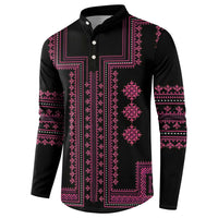 Black button-front sweatshirt with pink vertical geometric panel and patterned cuffs.