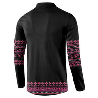 Black button-front sweatshirt back with pink geometric band print on sleeves and hem.
