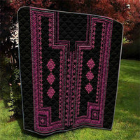 Black quilt with bright pink geometric border and vertical diamond motifs, quilted.