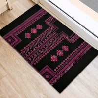 Black rubber doormat featuring pink Balkan border, stripes, and diamond ornament shapes