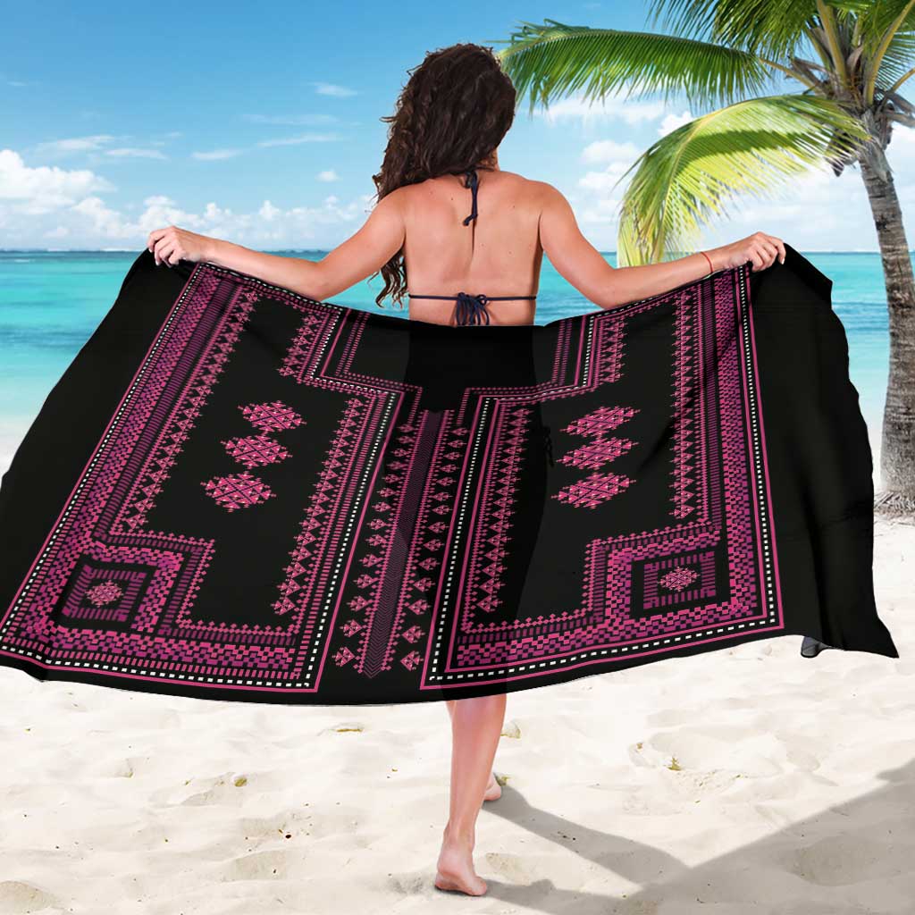 Black beach sarong with magenta vertical stripes and geometric medallion pattern