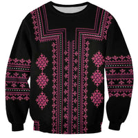 Black unisex sweatshirt with bold pink traditional patterned front