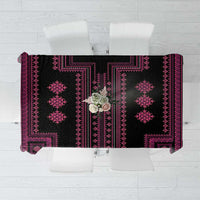 Flat-lay view of a black tablecloth with magenta geometric border pattern