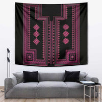 Black tapestry with bright pink geometric border and central vertical ornamental motifs.