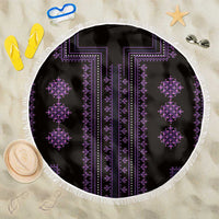 Round beach blanket top view, black with purple geometric motifs and white fringe