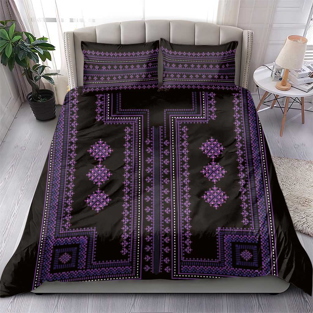 Purple geometric bedding set on a sofa bed with two coordinating pillow covers.