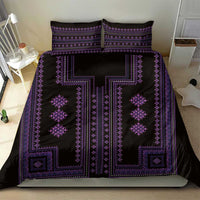 Purple-and-black traditional bedding set featuring large central cross-shaped design.