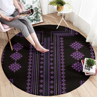 Round black traditional carpet rug with purple geometric stripe and diamond designs