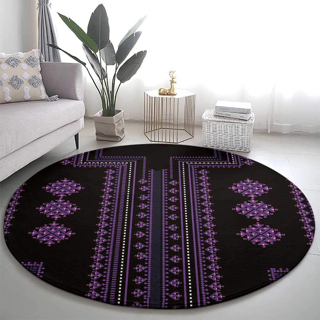 Round purple-and-black traditional patterned carpet rug
