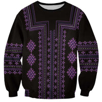 Black crewneck sweatshirt with full purple Balkan-style ornamental panel print