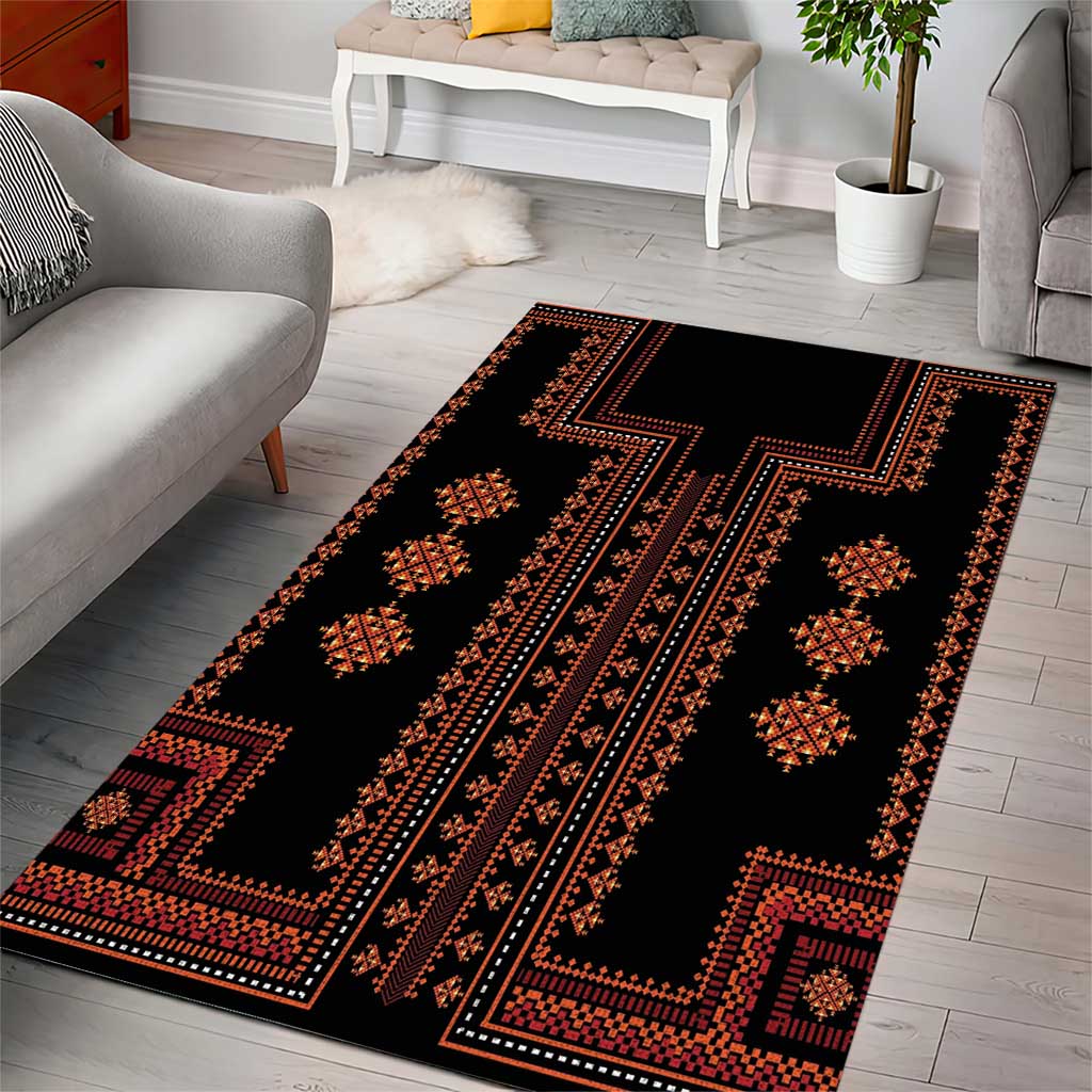 Geometric traditional area rug with black background, red-orange bands, and star motifs