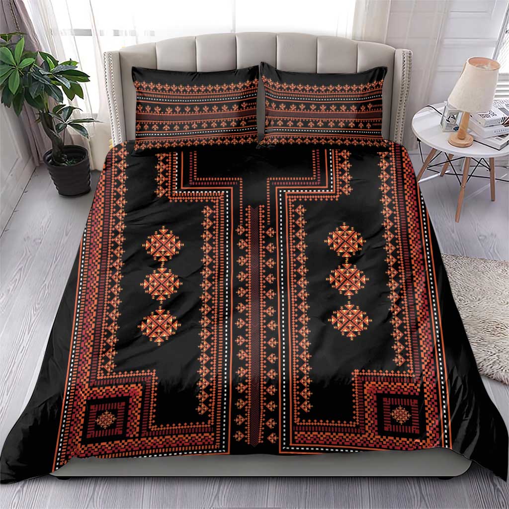 Black duvet cover with red geometric centerpiece pattern and two matching pillow shams