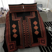 Black bedding set with red geometric border pattern and two pillow shams