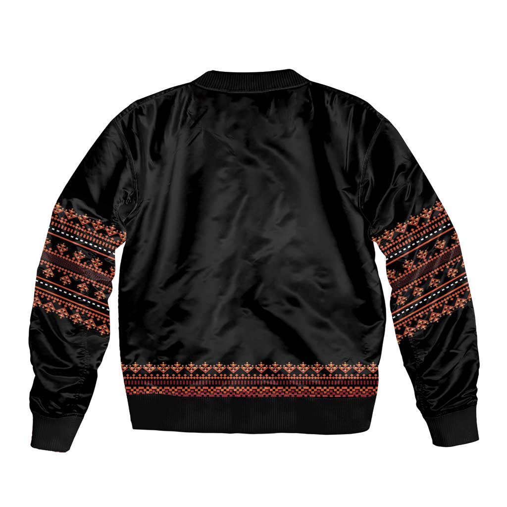 Unisex black bomber jacket back view with red-orange patterned band at hem