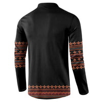 Black sweatshirt back with red-orange geometric band and striped cuffs