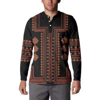 Black button-front sweatshirt with ornate red-orange border and vertical stripe design