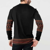 Black sweatshirt back with red-orange banded hem and patterned sleeves cuffs
