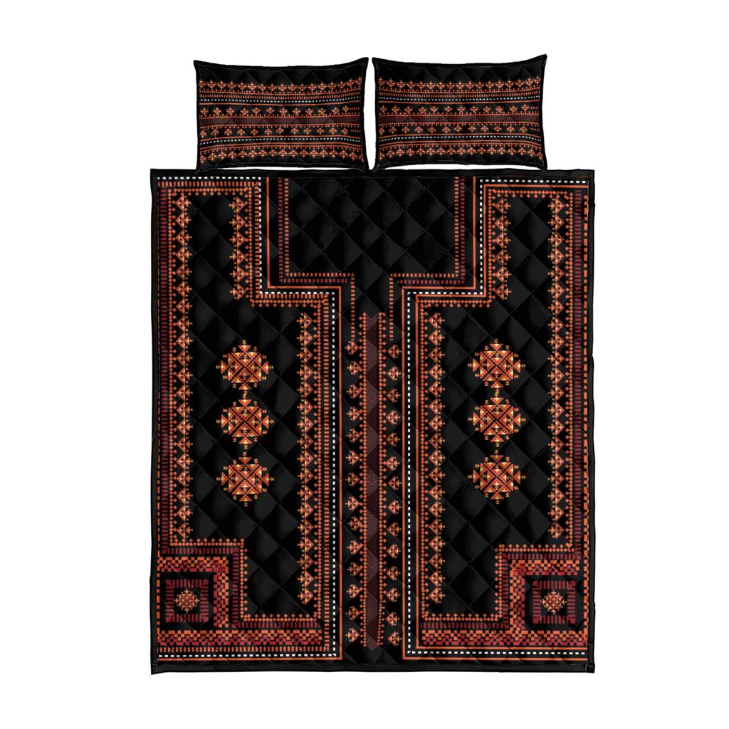 Quilt bed set with black base and red geometric Balkan pattern, includes two pillow shams