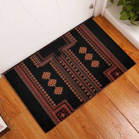 Black rubber doormat with red and orange geometric traditional border