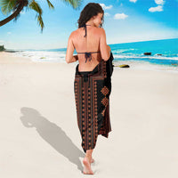 Black sarong with red-and-orange vertical stripes and diamond pattern, side-tie wrap