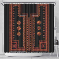 Red and orange geometric patterned shower curtain with dark center panels and vertical motifs