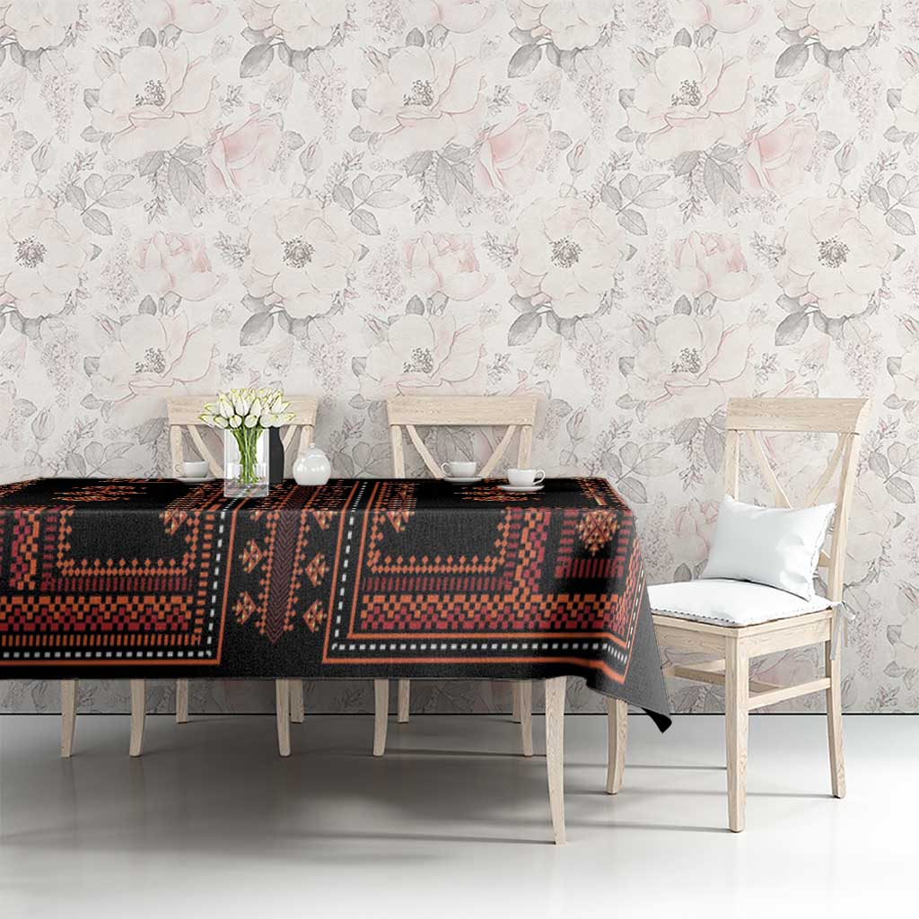Long rectangular tablecloth with black base and red-orange folk stripe pattern