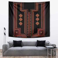 Red and orange geometric tapestry with central medallion motifs on dark fabric