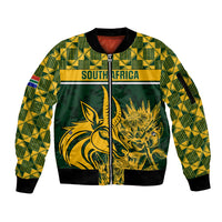 Green zip bomber jacket with gold South Africa graphic and patterned sleeves
