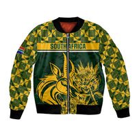 Green bomber jacket with yellow South Africa graphic and geometric patterned sleeves