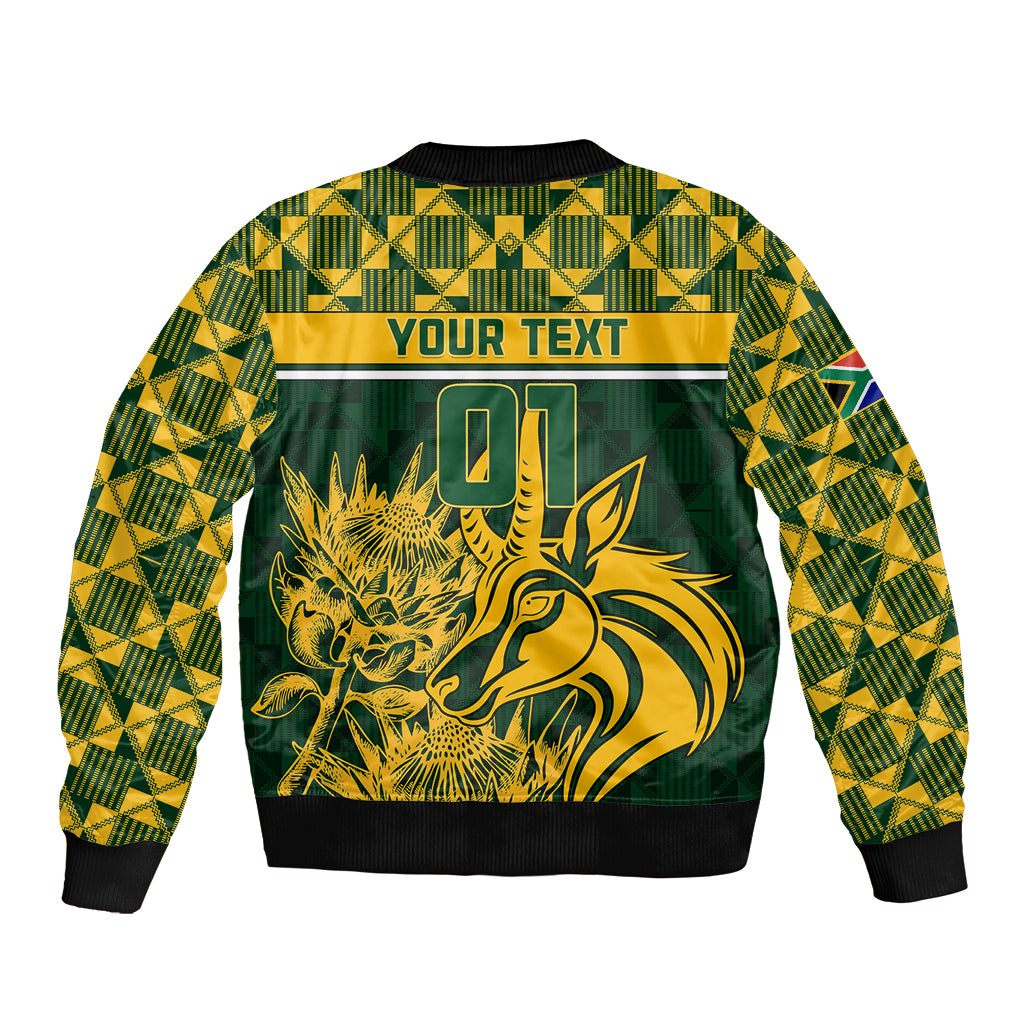 Green bomber jacket with yellow 01 graphic, geometric pattern, and striped yoke