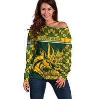 Women’s green off-shoulder sweater with long sleeves and South Africa graphic print